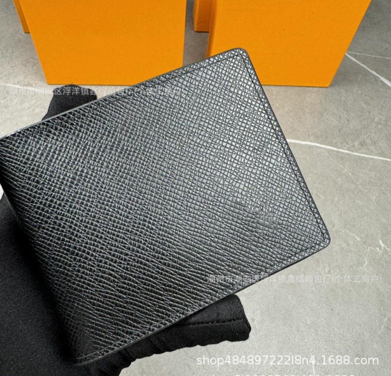 Cartera de moda de hombre transfronteriza europea y americana corta billetera de cuero real plegable para mujeres embalaje de cartera de suministro de comercio exterior Q217