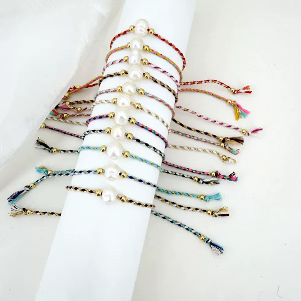 Cross-border best-selling new product: four-color hand-woven cotton rope bracelet with copper beads and large-hole pearls, niche design, manufacturer wholesale, musical note