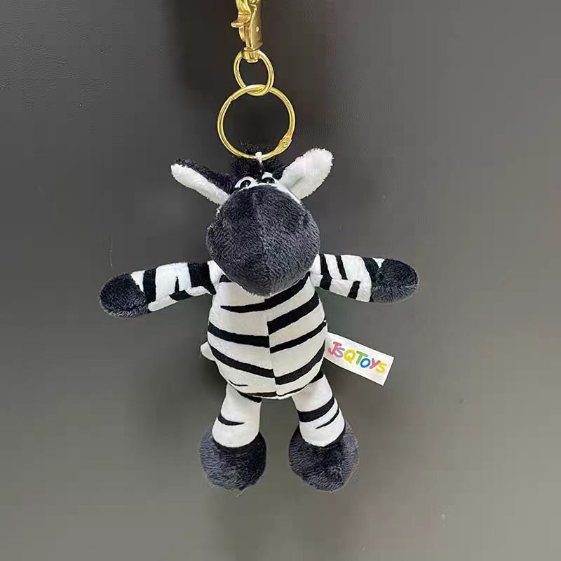 Nuevo transfronterizo jungla animal llavero elefante león colgante juguetes de peluche decoración bolsos llavero al por mayor