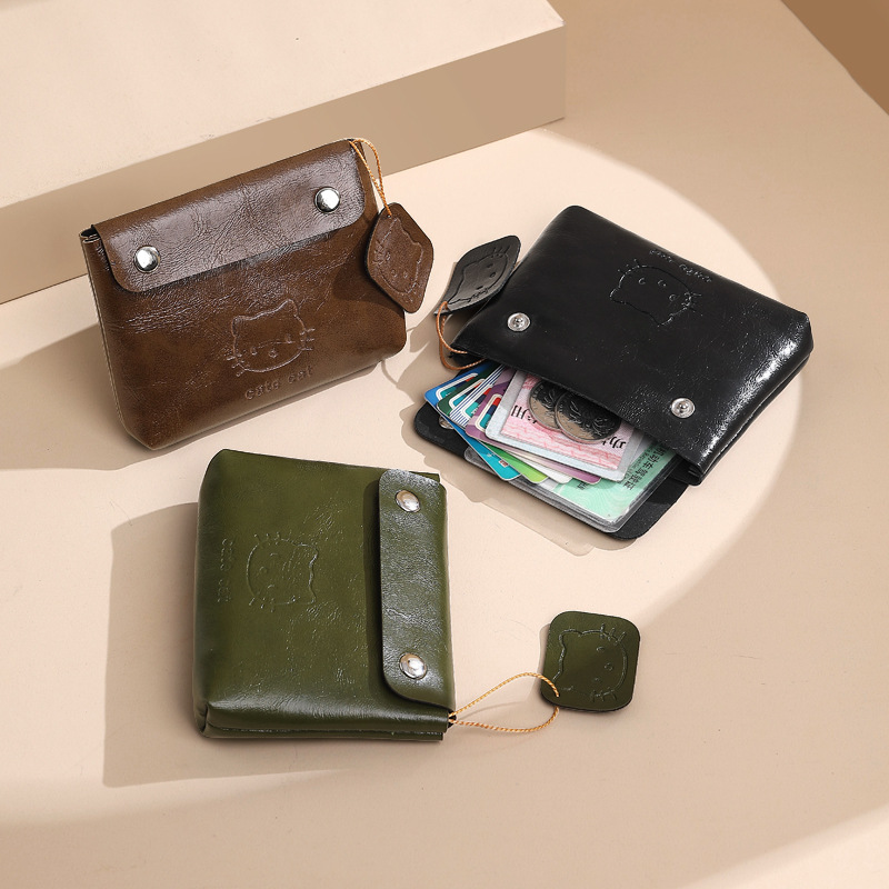 Bolso de cambio de comercio exterior para mujeres nuevo bolso corto delgado color sólido PU bolso de cambio mini cremallera bolsa de tarjetas bolsa de monedas