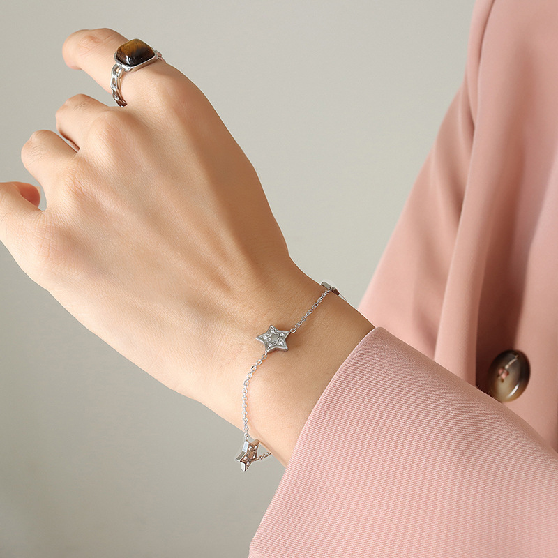 Europea y Americana de cinco puntas de circón Luz de lujo todo fósforo collar pulsera mujer transfronteriza de titanio de acero de la vendimia joyería al por mayor traje de la joyería