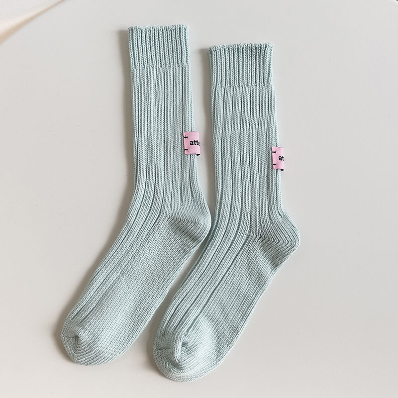 Nicho etiqueta rosa japonés retro color puro algodón crudo embrión línea gruesa media pantorrilla calcetines Otoño e Invierno hombres y mujeres calcetines largos de pila ins