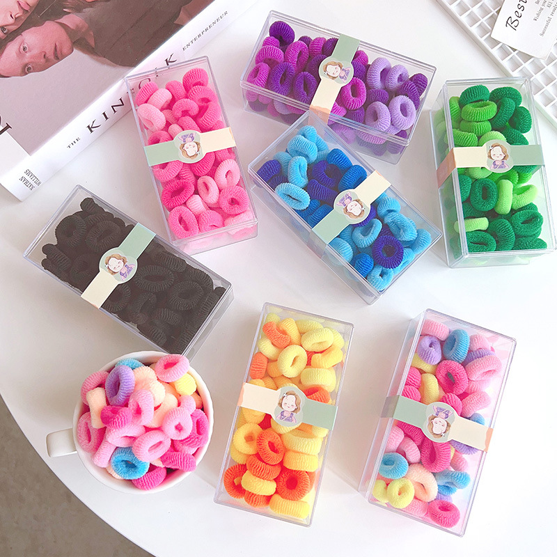 Banda de pelo de toalla suave de algodón color del arco iris 60 piezas en caja cuerda de lazo de pelo de bebé banda de goma para niños no daña el cabello accesorios para el cabello de los niños