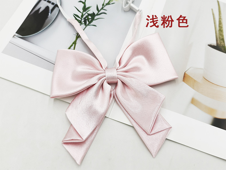 Spot al por mayor color sólido superficie brillante vino negro cuello rojo flor femenino estilo universitario nuevo estilo cola de golondrina plegable pajarita de raíz de pluma grande