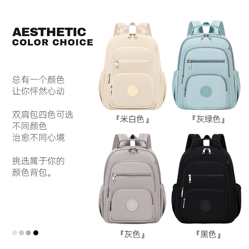 Mochila impermeable de gran capacidad para mujer, nueva colección 2025, venta al por mayor del fabricante, mochila de doble hombro de color sólido, bolso de gran capacidad con múltiples bolsillos