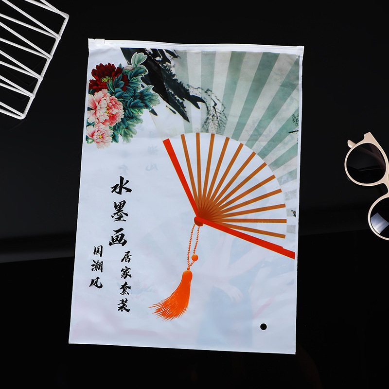 Bolsa con cremallera de ropa Bolsa con cremallera de crisantemo pequeño Bolsa de embalaje de camiseta Bolsa de ropa interior Bolsa de ropa PE esmerilada pequeña bolsa ziplock