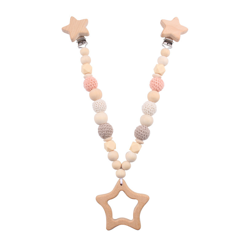 Nuevos productos para bebés abrazaderas de abrazaderas de haz de dibujos animados DIY pulsera de dientes molares decoración colgante de campana cuatro piezas