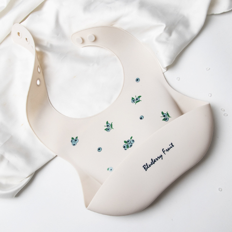 Babero de silicona estilo INS para niños, impermeable, tridimensional, desechable, ideal para la hora de la comida.