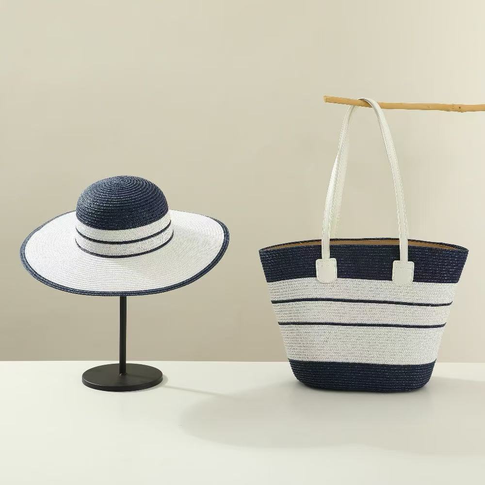 El nuevo bolso de sombrero de paja de verano tiene dos juegos de sombreros de sol de viaje al aire libre de alta gama de moda con bolsos de paja de temperamento.
