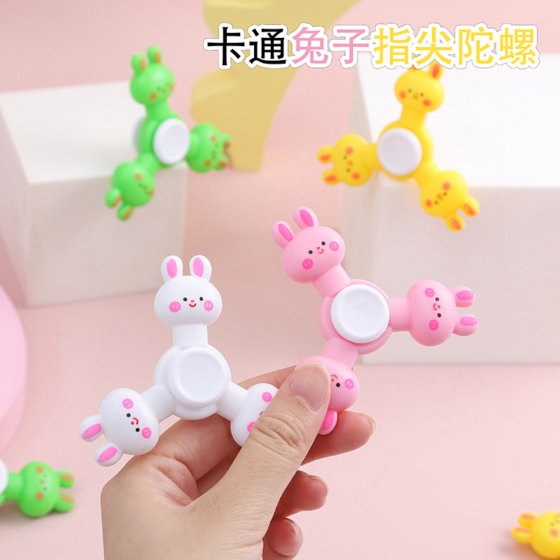 Cadena transfronteriza punta de dedo giroscopio estand rotatorio de descompresión de regalo de jardín de infantes azúcar juguetes descompresivos al por mayor