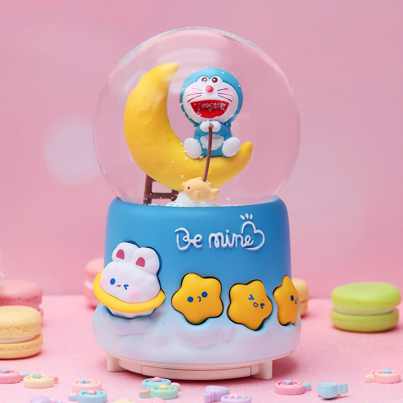 Linda campana tren azul gordo bola de cristal caja de música para niños y compañeros de clase regalo caja de música de nieve brillante