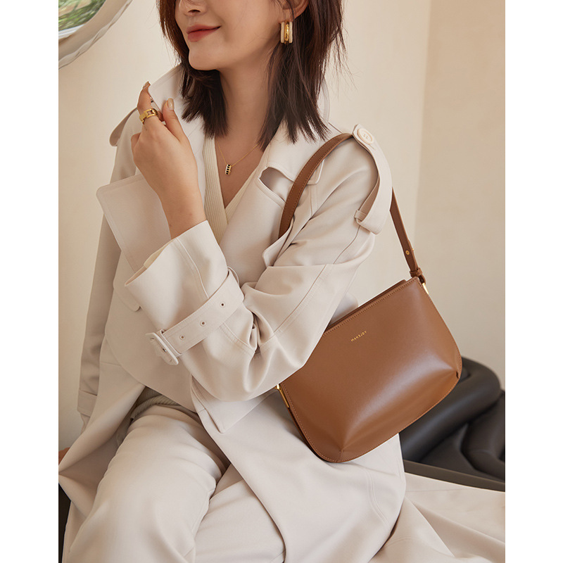 2024 Nuova borsa a mano minimalista in vera pelle, design unico da donna, alta qualità e squisita monospalla_voghion.com