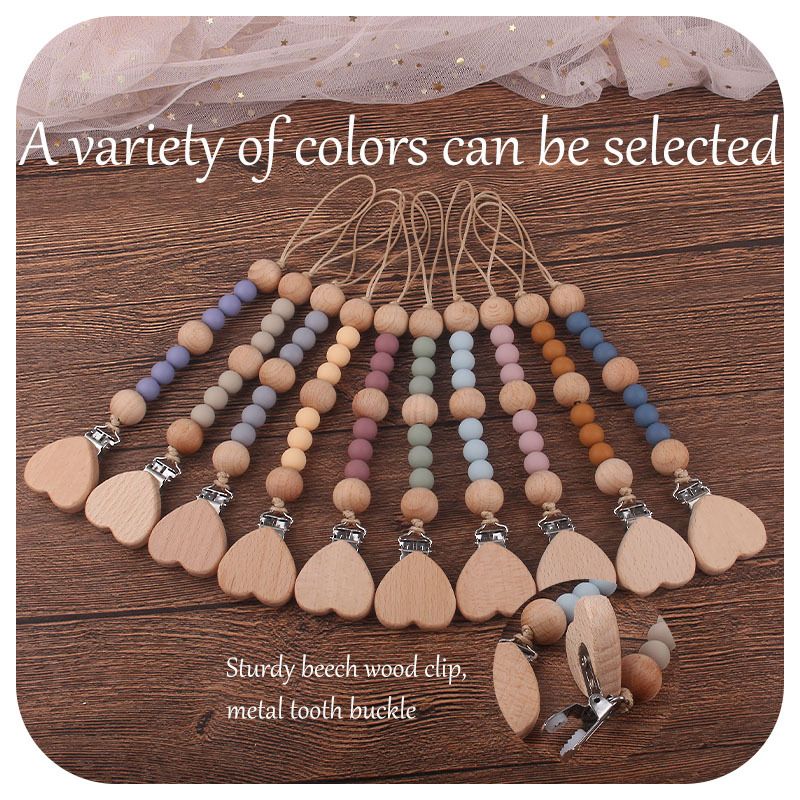 Nuevos suministros para bebés Beech Love Clip calmante bebé tela de algodón anti-gota Cadena de silicona perlas pezón cadena traje