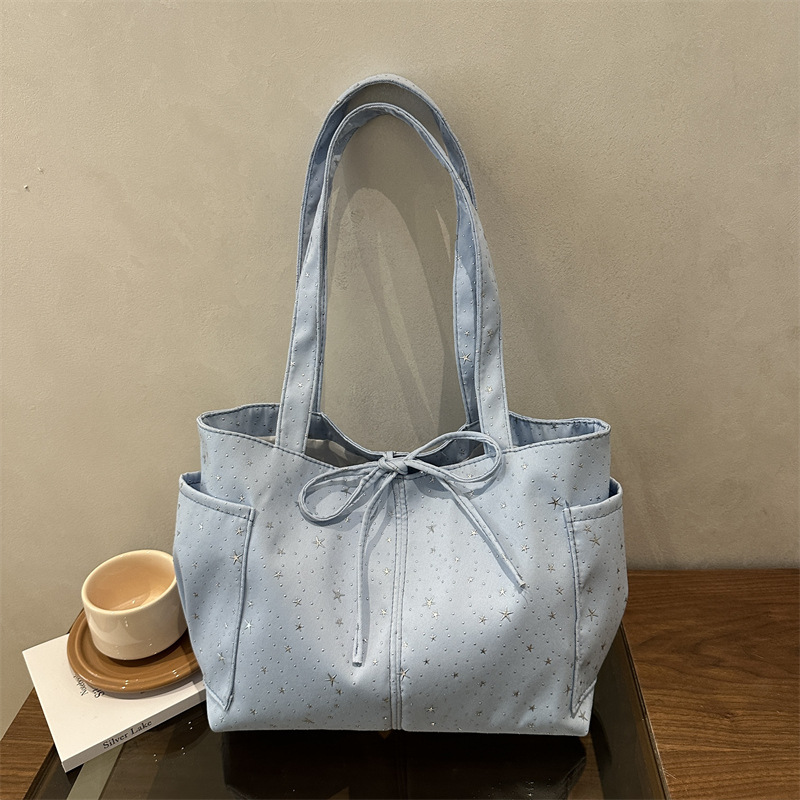 2026 nuevo estilo coreano de impresión de estrellas bolsos de mujer bolsos de gran capacidad de viaje bolsos de hombro de moda bolsos de brazo portátiles