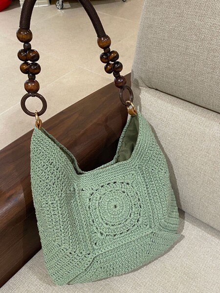 Capacious knitted handmade bag