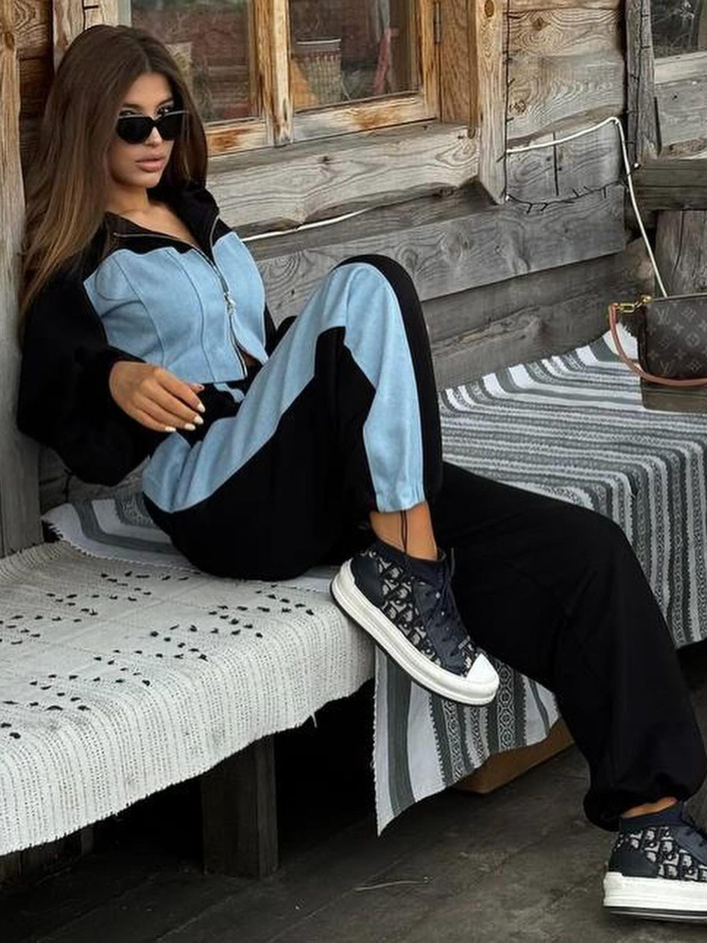 D9727 venta caliente suéter de moda casual de mujer europea y americana costura de mezclilla con capucha top pantalones de dos piezas