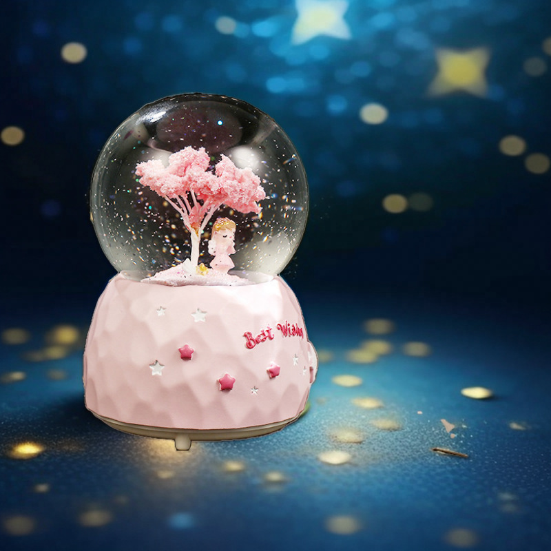 夢の雪の水晶の玉の机はオルゴールのオルゴールの女の子の誕生日の子供の六一子供の日のプレゼントを並べます。|undefined