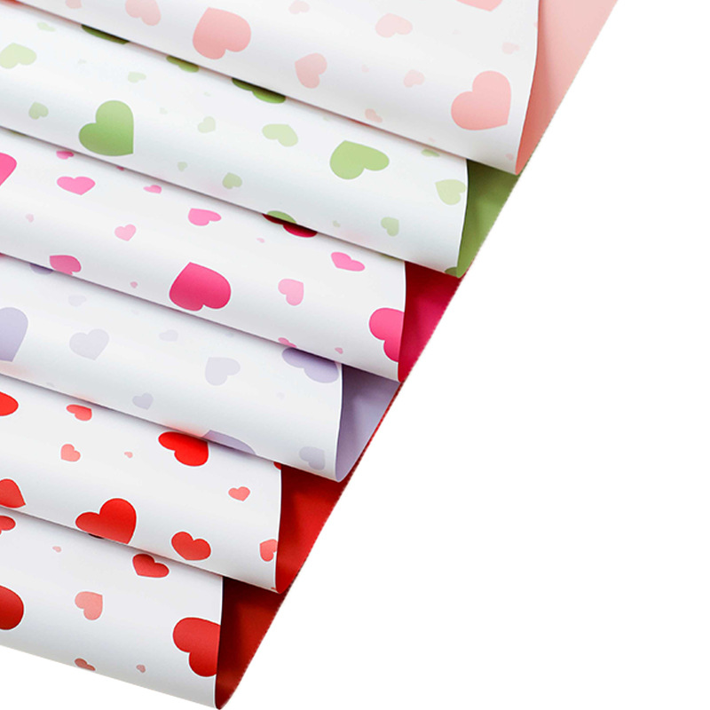 Papel de pluma brillante corazón de papel de embalaje de flores plástico amor colorido papel de envoltura de dopamina florista florística arte