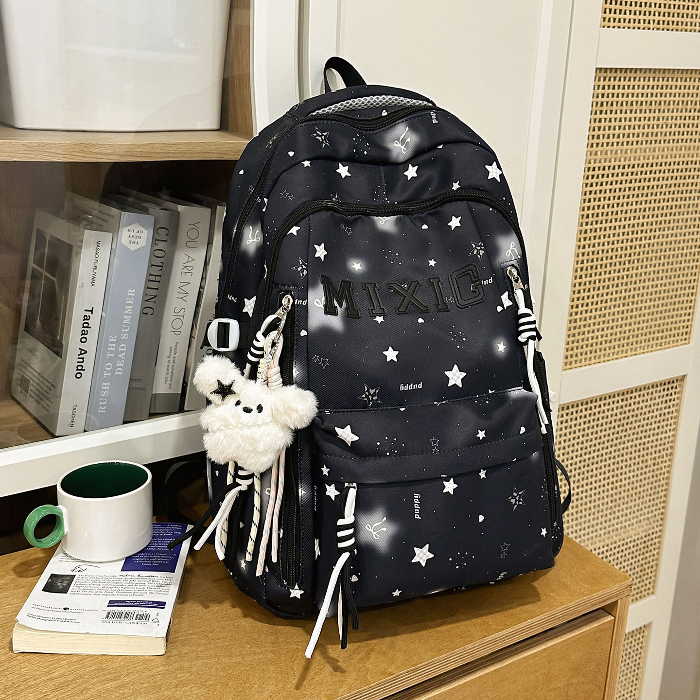 Black double shoulder strap black star white angora rabbit charm