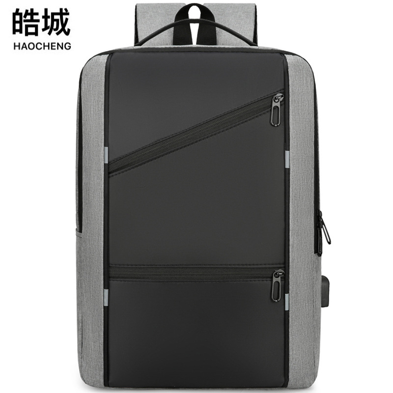 2024 nueva mochila de computadora de gran capacidad con carga USB para hombre mochila de viaje simple de negocios multifuncional mochila escolar