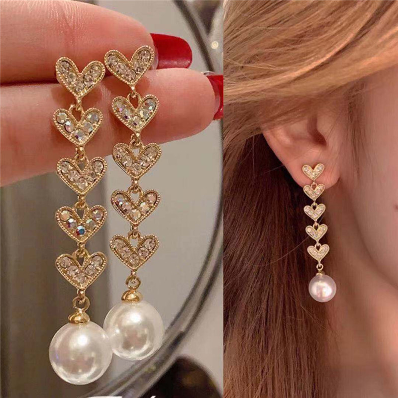 Long small design summer earrings pearl