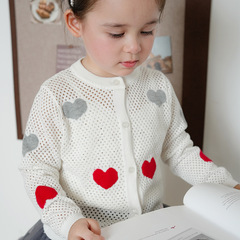 A drop-shipping spring and autumn baby cardigan sweater for children, a hollow top, and a thin love coat for girls.