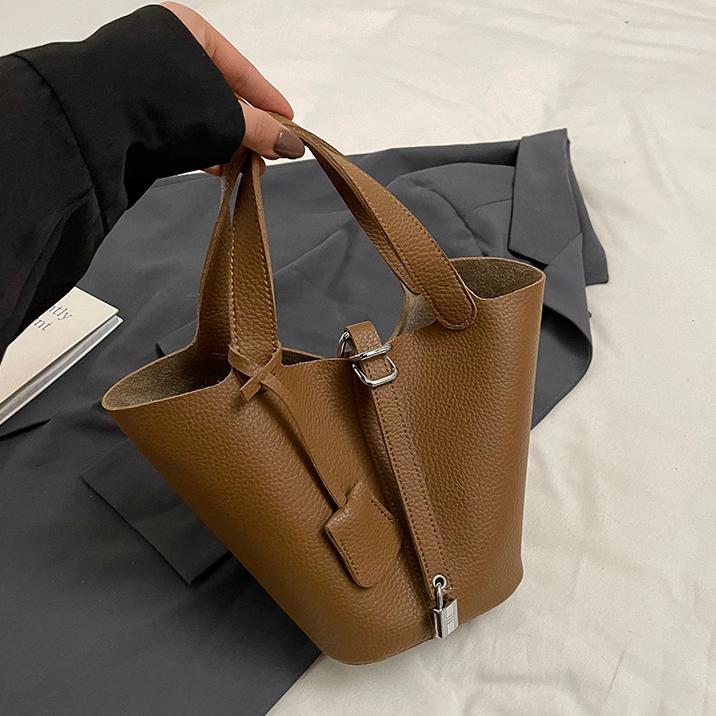 Bolsos de cesta de verduras de estilo caliente de comercio exterior para mujer 2025 nuevo bolso de cubo de ocio simple bolso femenino de alta gama de nicho