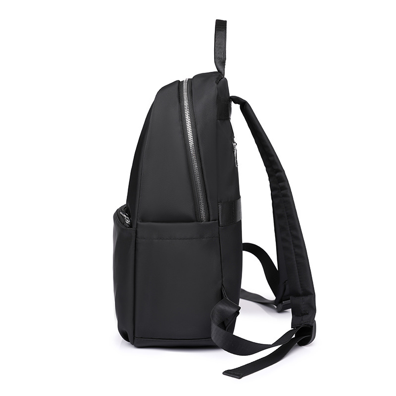 Mochila para computadora de 14 pulgadas de gran capacidad 2024 nueva mochila de viaje ligera de nailon casual mochila escolar simple de color sólido