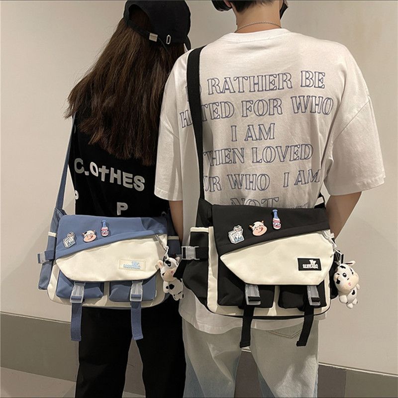 Bolso de hombro de moda para hombres, bolso de hombro para mujeres japonesas de gran capacidad, bolso de estudiantes casuales, bolso de cartero para hombres