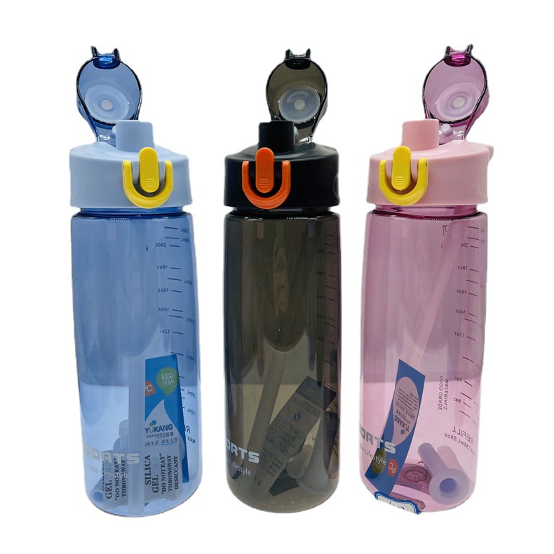 Fábrica al por mayor de plástico taza de agua portátil estudiante masculino y femenino taza de paja 750ml cubierta de rebote hervidor de agua potable