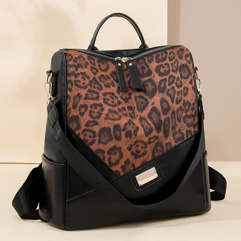 Comercio exterior al por mayor 2025 nuevo estilo estampado de leopardo contraste color damas PU mochila de viaje multifuncional de moda