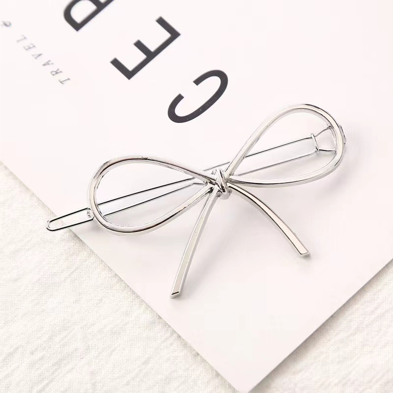 Simple Style Geometric Moon Bow Knot Alloy Plating Hair Clip display picture 5