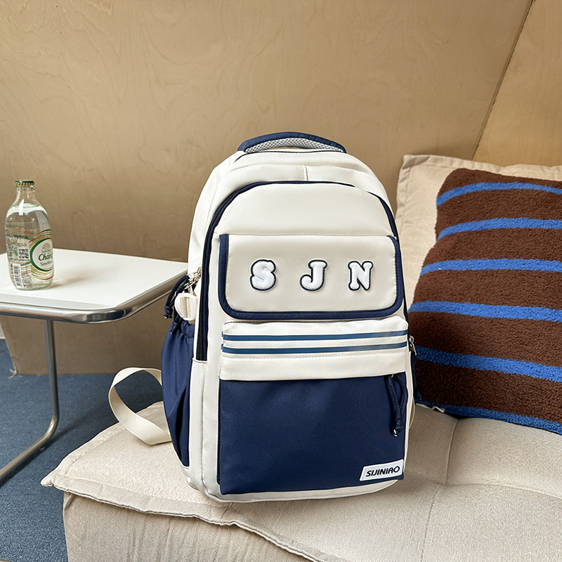 Nueva mochila escolar de gran capacidad, mochila de moda para estudiantes de secundaria coreana, mochila de pareja de estudiantes universitarios de estilo universitario de todo fósforo