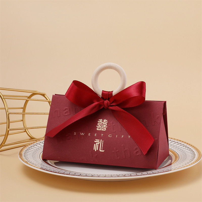 クリエイティブシャンパン色の手提げ婚約結婚結婚式の三角喜糖箱木環お土産魚尾紗喜糖箱|undefined