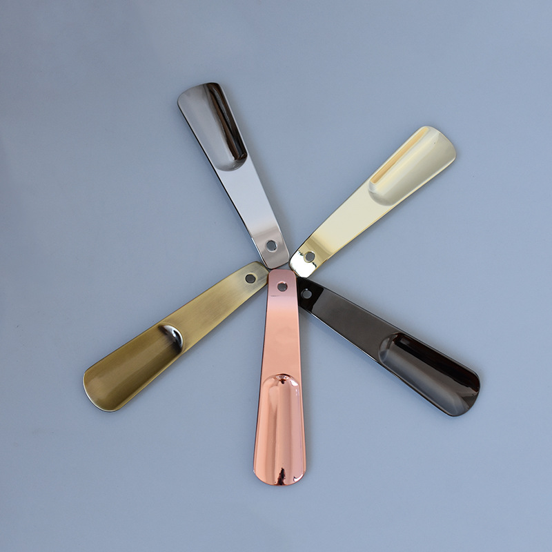 En stock suministro de acero inoxidable 14cm largo pequeño calzador metal espesado zapato extractor dispositivo