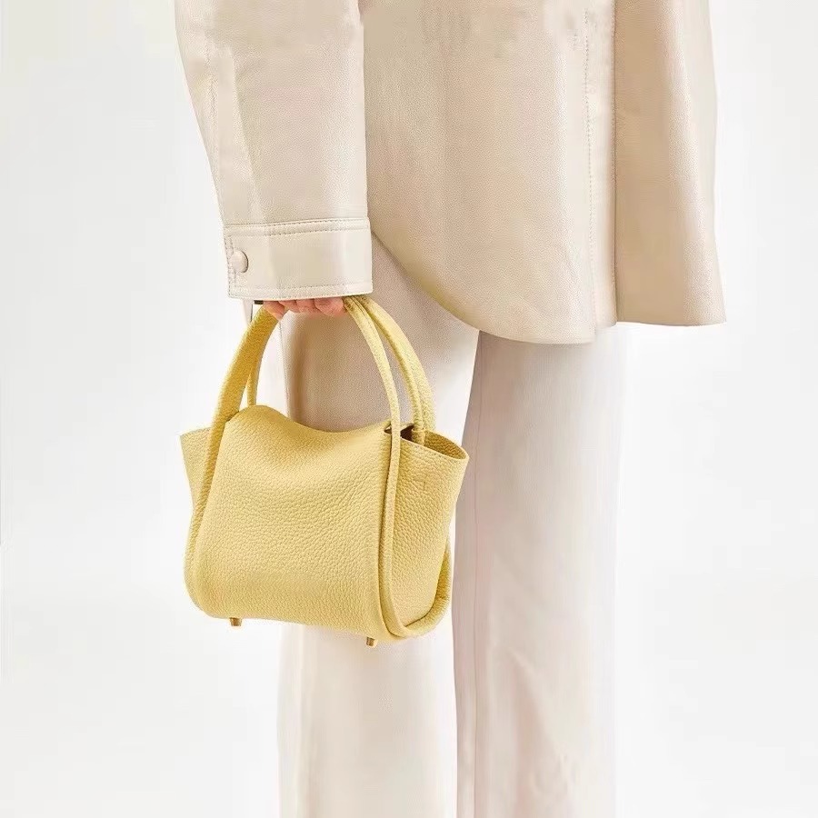 SONGMONT MOUNTAIN에는 느슨한 잉곳 가방 바구니 시리즈 새로운 틈새 패션 올 매치 휴대용 메신저 백이 있습니다.