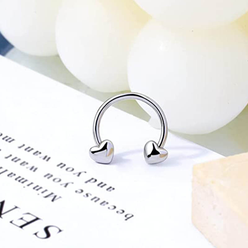 Silver pointed spike labret stud material detail
