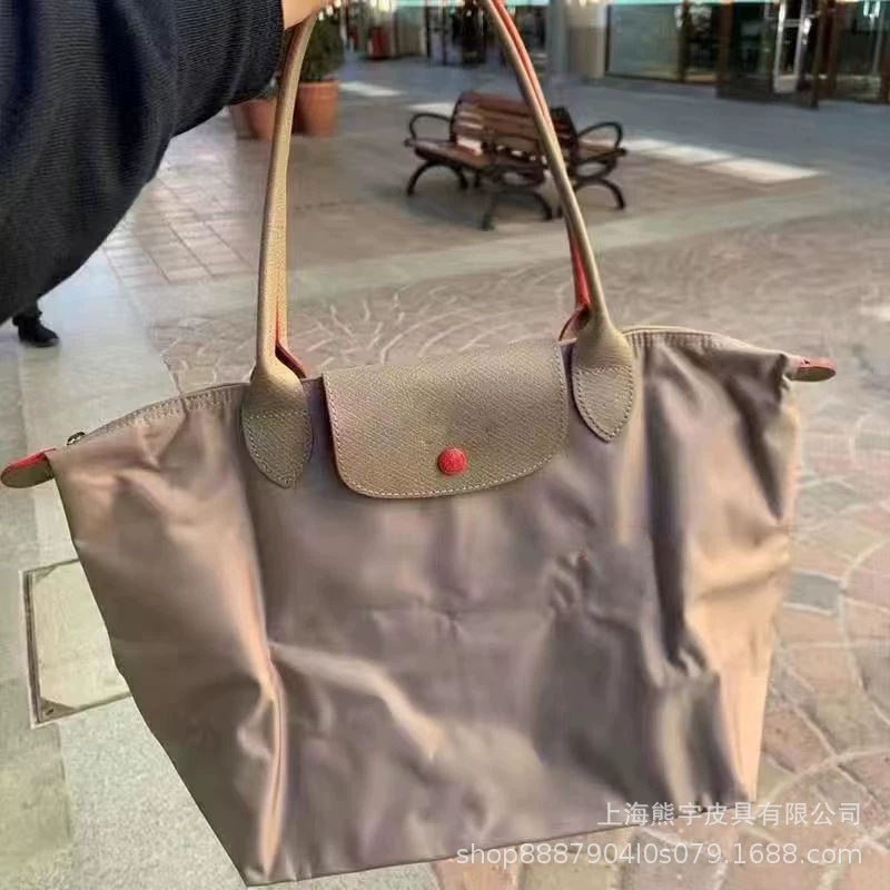 Foldable capacious purse for mother and baby, one-shoulder bag