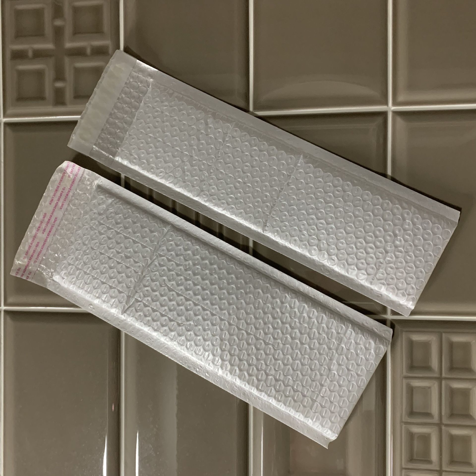 10*65 + 4 y otro compuesto nacarado película delgada tira burbuja bolsa sobre bolsa estrecha larga burbuja expreso bolsa