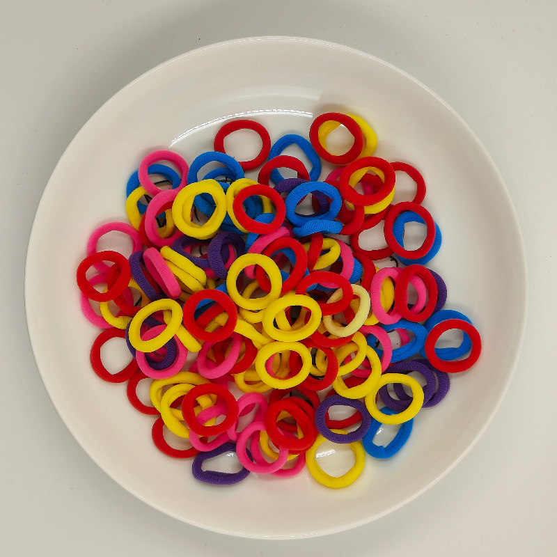 Color de caramelo de alta elasticidad pequeña toalla anillo de cabello bebé anillo de cabello no daña cabello atado fábrica de cabello al por mayor