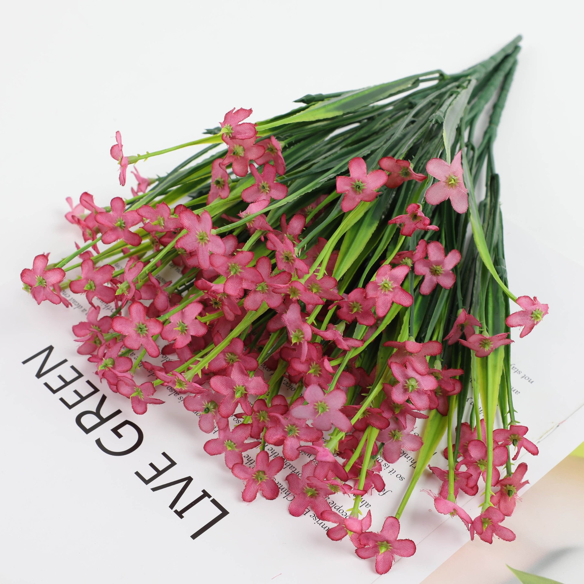 Simulación de plantas acuáticas plástico hierba de primavera flor violeta serigrafía hierba de primavera de cinco cabezas pequeña margarita flor falsa accesorios decorativos al por mayor