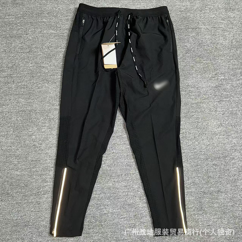 Explosión transfronteriza de un tipo idéntico de tecnología de prevención de tres secado rápido tela casual tela cremallera deportiva de protección solar pantalones de hombre