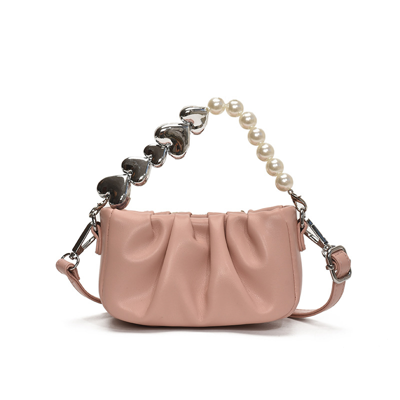 Nuevo bolso para niños, bolso de niña perla de amor fresco y dulce, mini bolso de mensajero para bebé plisado de estilo occidental