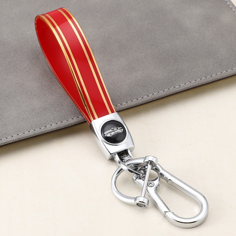 Cuerda de mano de silicona transfronteriza llavero de coche logotipo de coche apellido llavero anti-pérdida llavero de cuerda de mano de silicona duradera