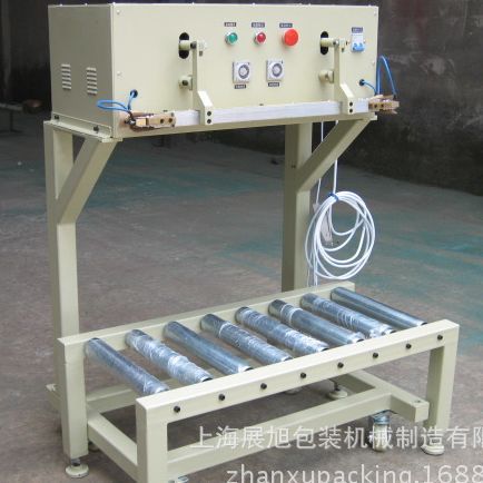 供应优质气动封口机，大包装封口机，立式封口机。