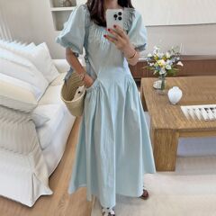 甜美风纯色V领泡泡袖连衣裙2025夏季新款气质口袋设计感A字长裙女