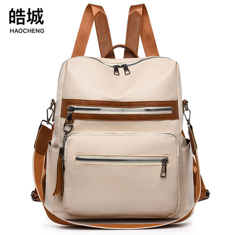 2024 nuevo estilo borla versión coreana de las señoras de cuero suave mochila de viaje multifuncional de gran capacidad de color de contraste de moda