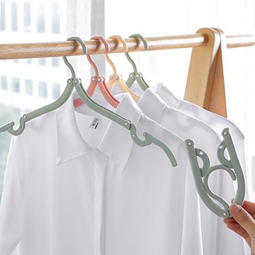 Wholesale 8 folding clothes hangers for adults and children, portable multi-functional home traceless anti-slip clothes plastic hangers