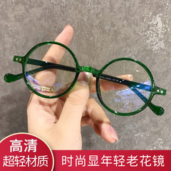 レトロな小さい丸い枠の老眼鏡の緑色のファッションの文芸は明らかに若くて青い光の鏡の古い光の鏡の工場を防ぎます。