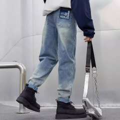 春秋タイプの男の子のジーパンのファッションの復古風の弾力性のグラデーションの工芸の子供服のズボンの子供の外はズボンのファッションを着ます。